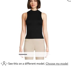 Target black turtleneck sleeveless top- hits around mid waist height